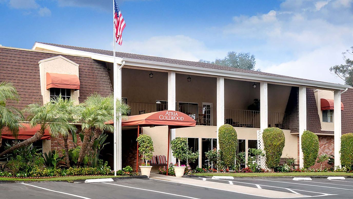 Exterior view of Atria Collwood facility with well-maintained landscaping