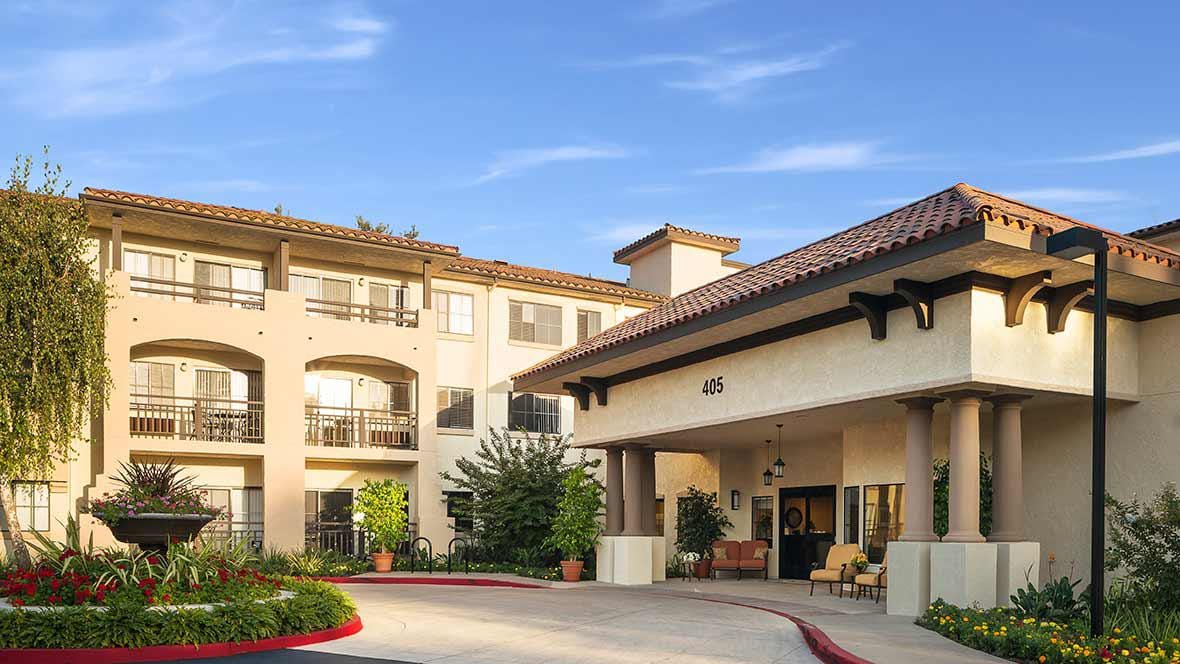 Exterior view of Atria Hillcrest with landscaping