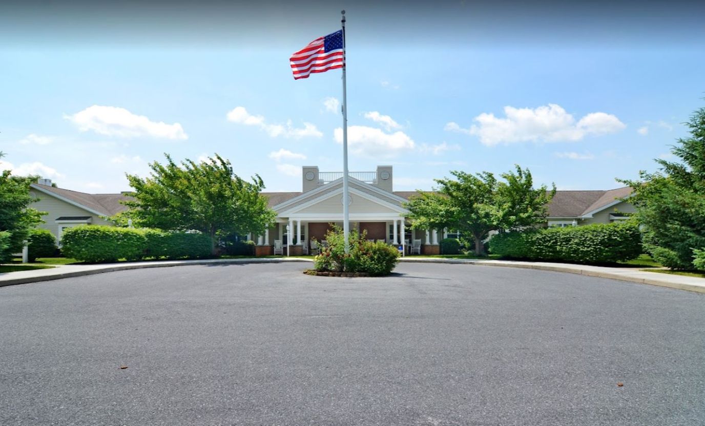 Exterior view of Celebration Villa with landscaped entrance