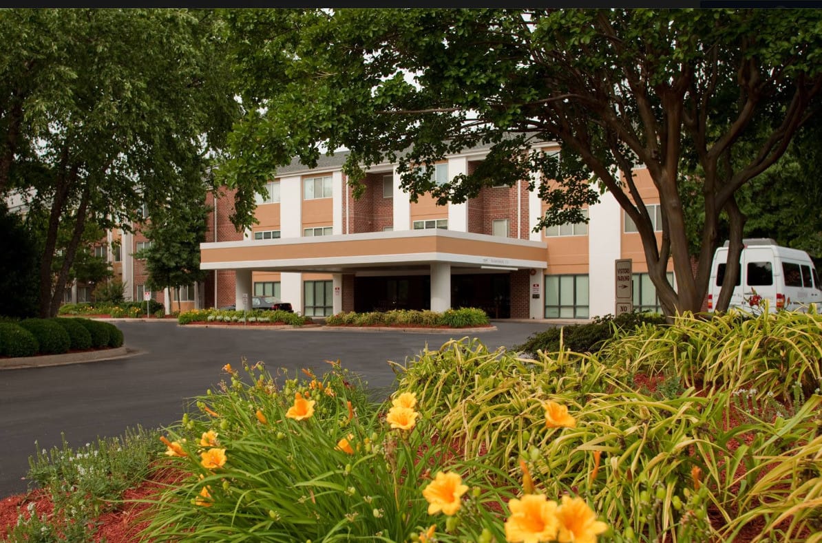 Exterior view of The Devonshire Senior Living facility