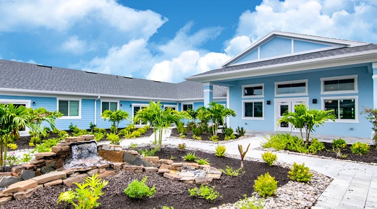 Exterior view of the facility with landscaped garden