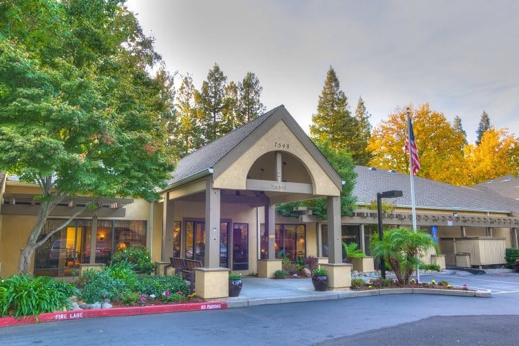 Exterior view of the Spanish Vines Assisted Living entrance