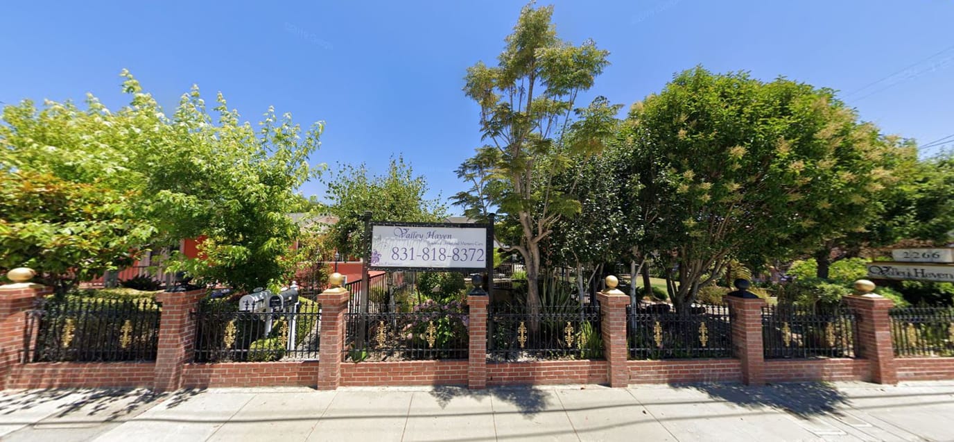 Exterior view of Valley Haven with a garden