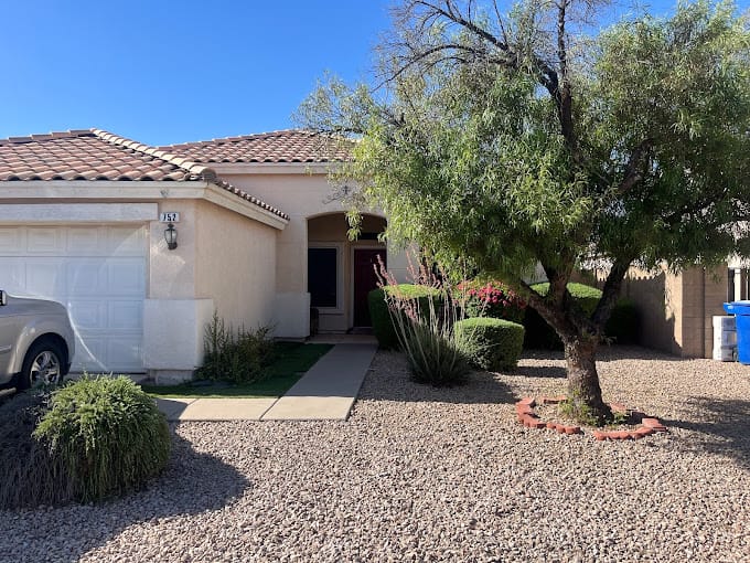 Exterior view of a house with landscaping