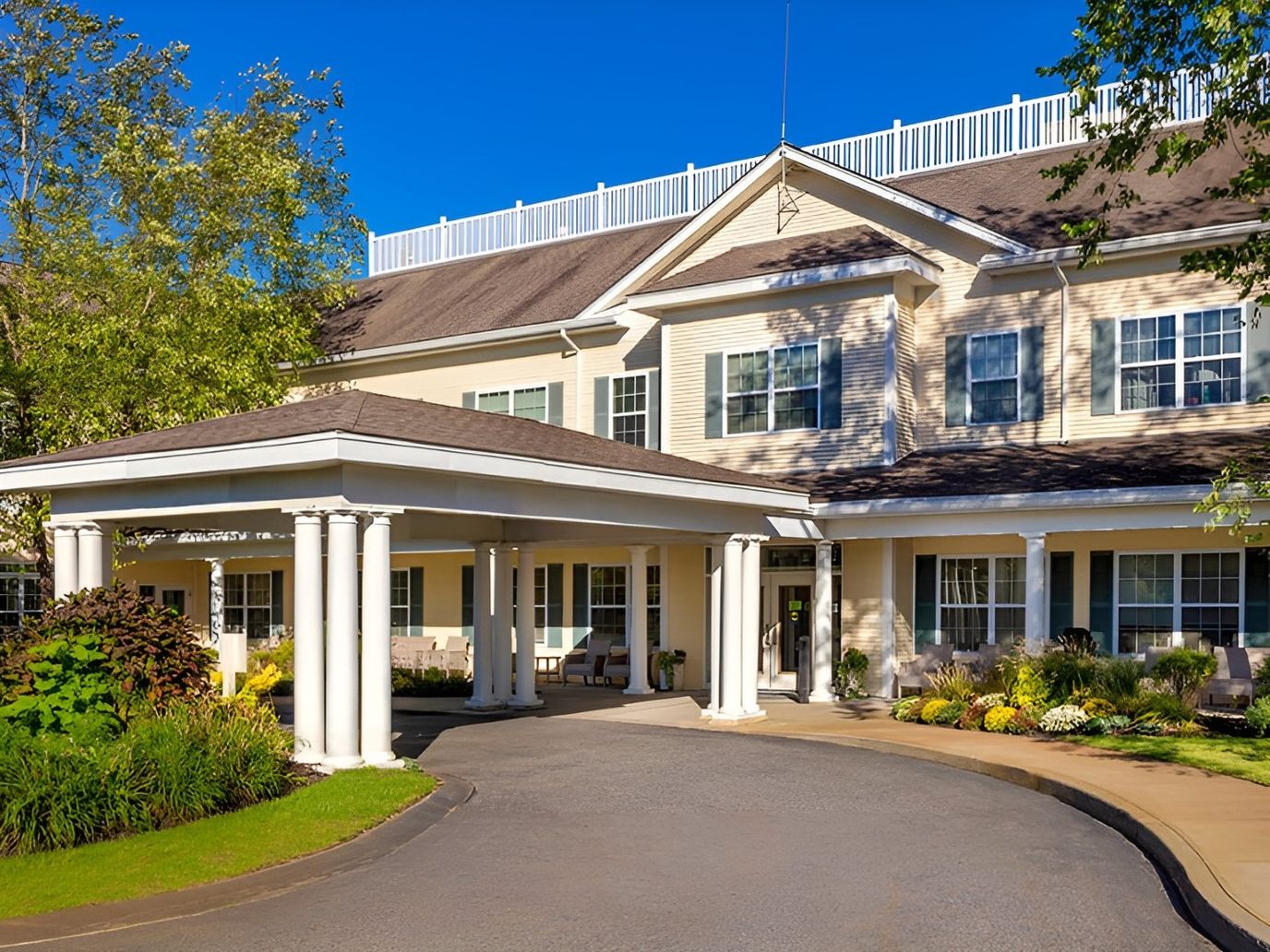 Entrance of Atria Fairhaven with gardens