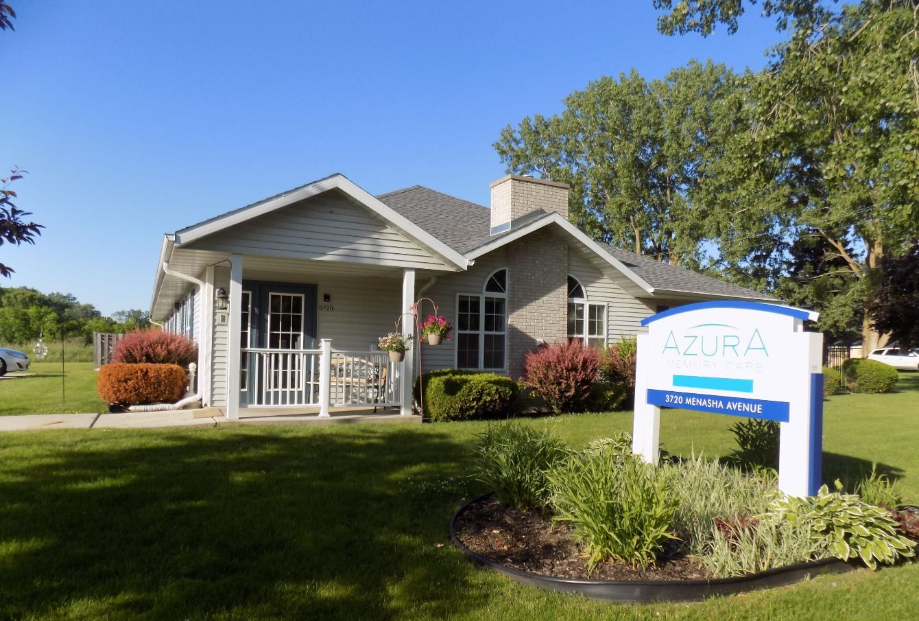 Exterior view of Azura Memory Care building with landscaping