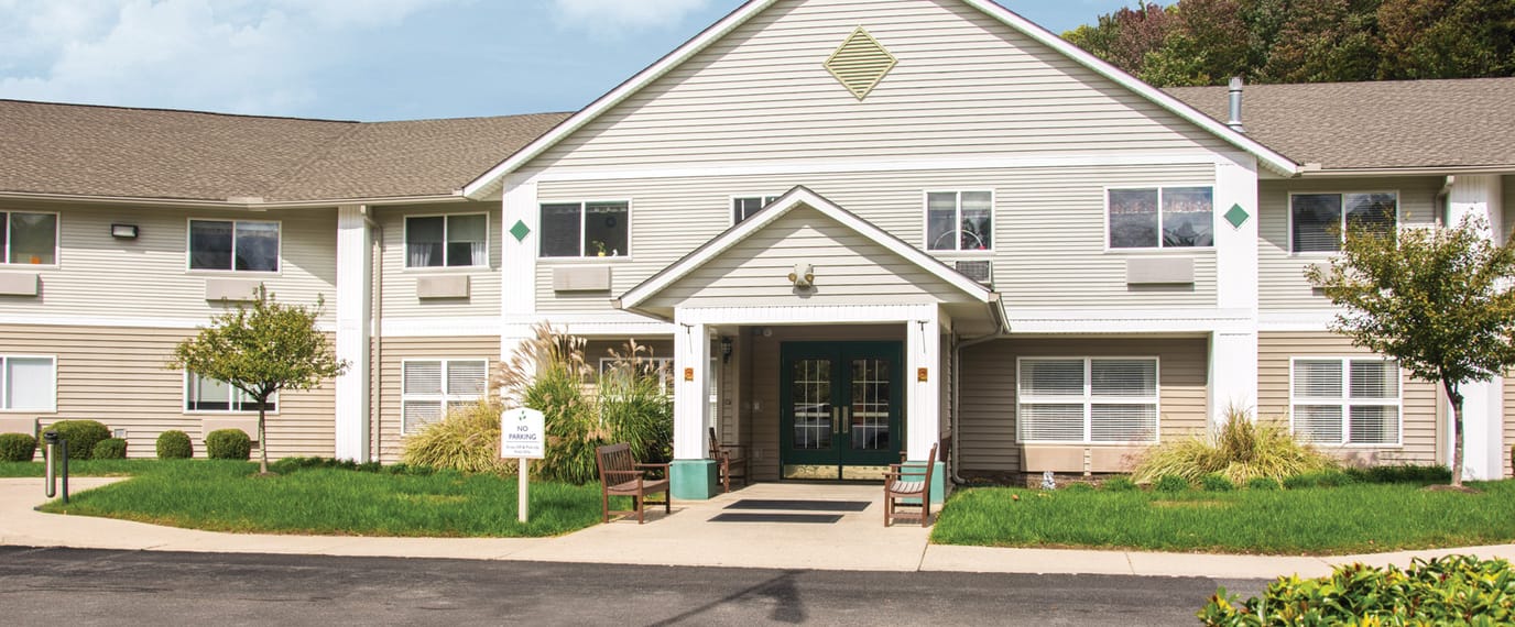 Exterior view of an assisted living facility entrance