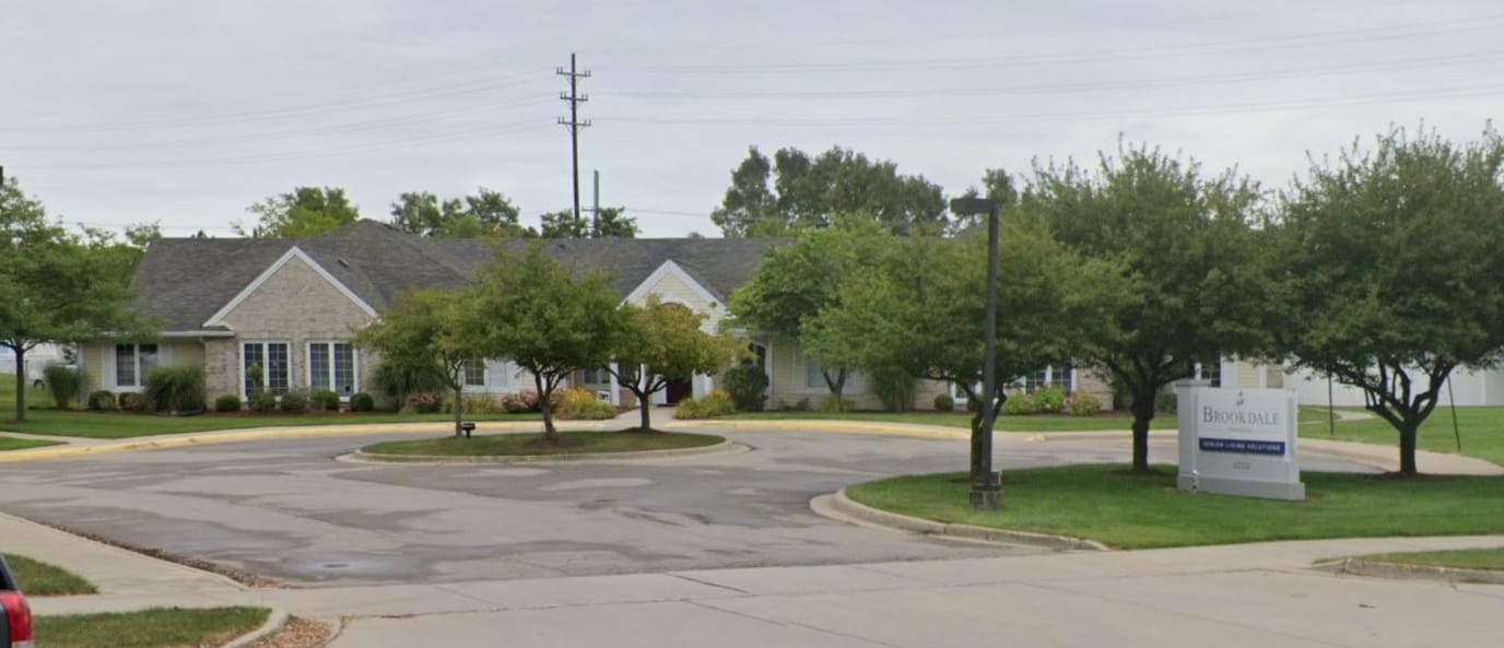 Exterior view of Brookdale Meridian facility with landscaping