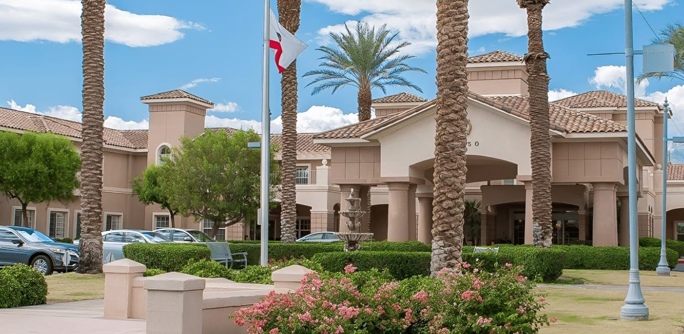 Exterior view of Brookdale Mirage Inn with landscaping