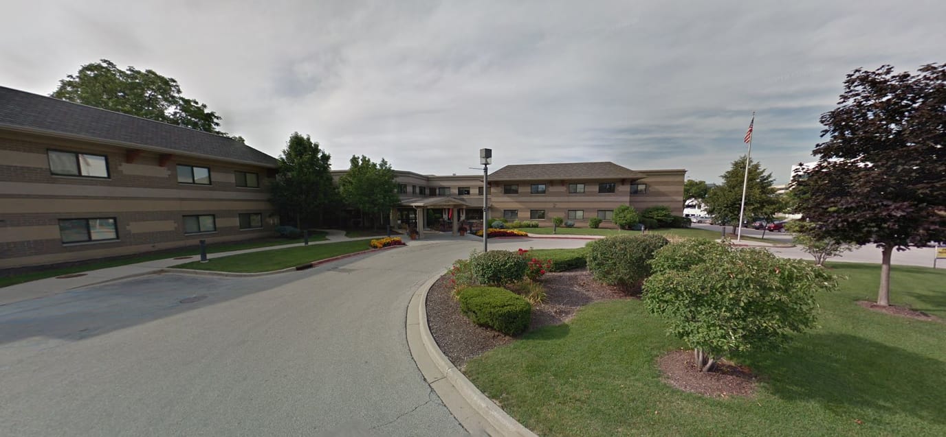Exterior view of St. Camillus facility with landscaping