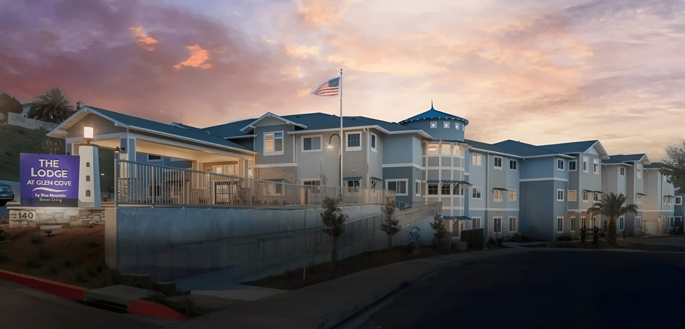 Exterior view of The Lodge at Glen Cove at dusk