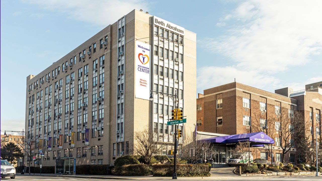Exterior view of Beth Abraham facility with entrance