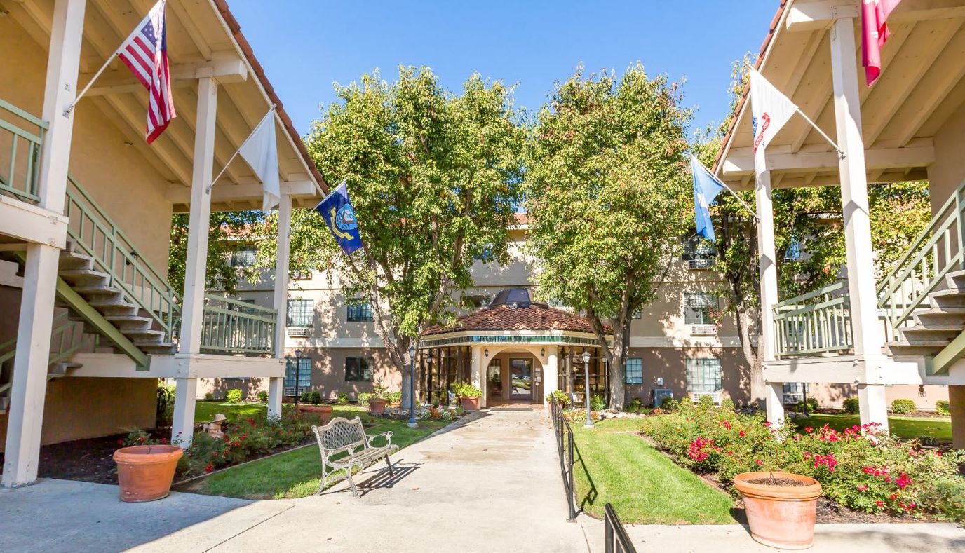 Entrance view of Brookdale Tracy with well-kept landscaping