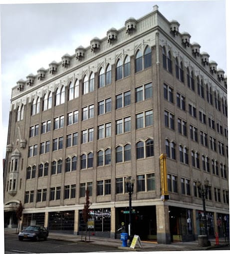 Exterior view of a large building with architectural details