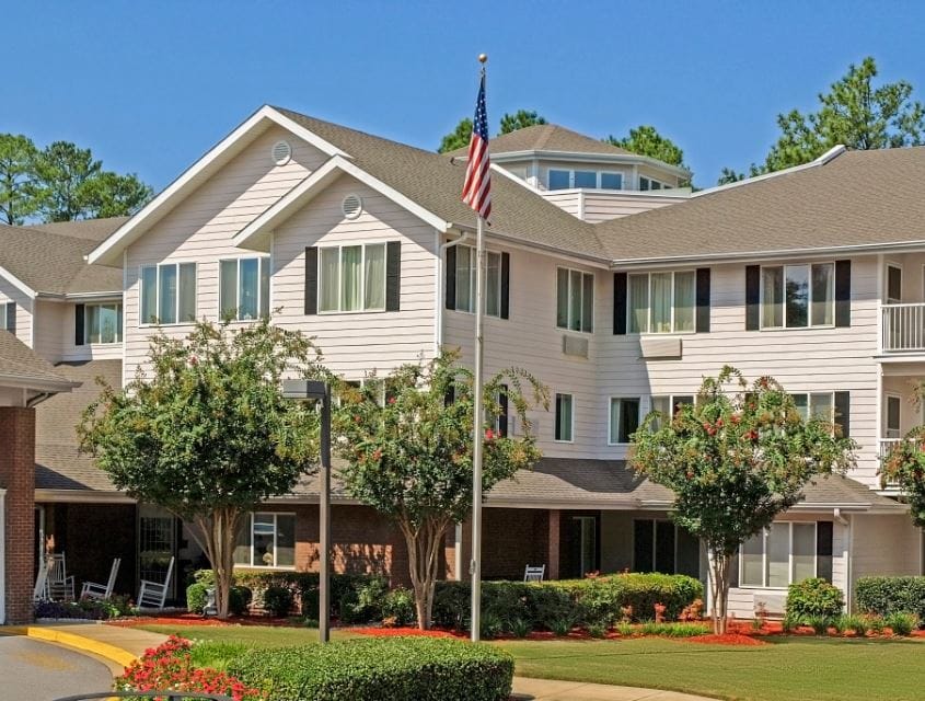 Building facade of Deepwood Estates with landscaped gardens