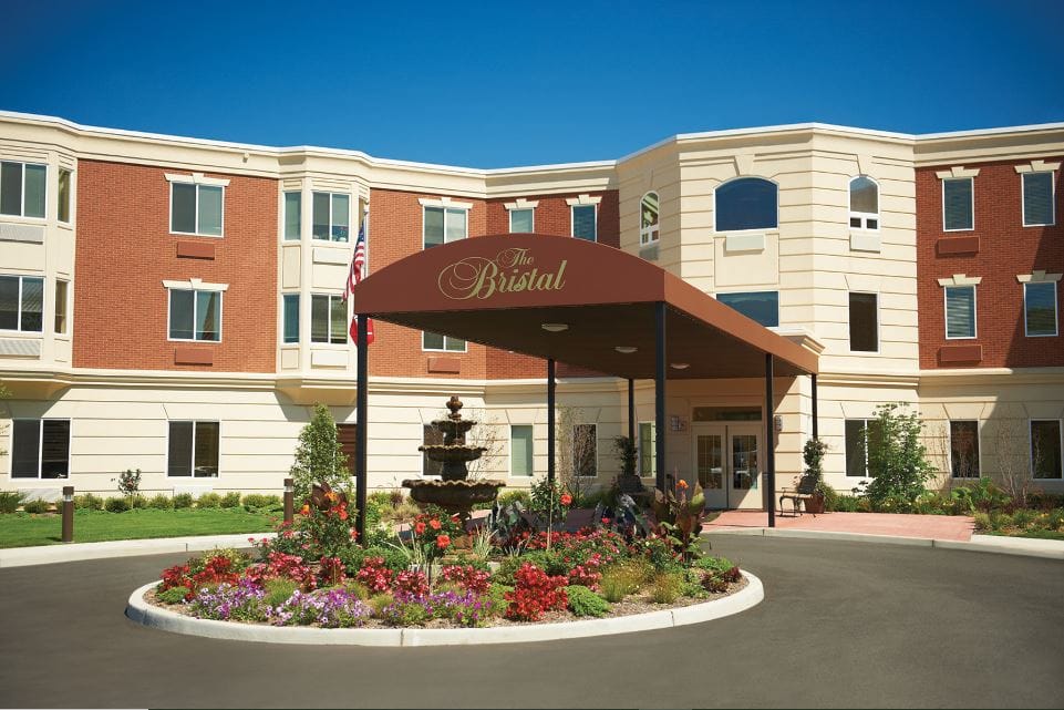 Exterior view of The Bristal building with gardens
