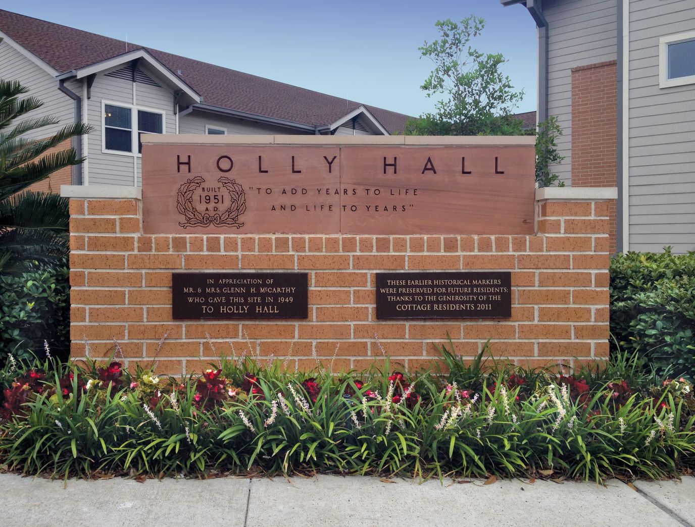 Signage at the entrance of Holly Hall facility