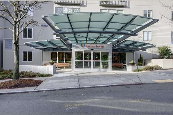 Entrance of Horizon House with a modern canopy structure