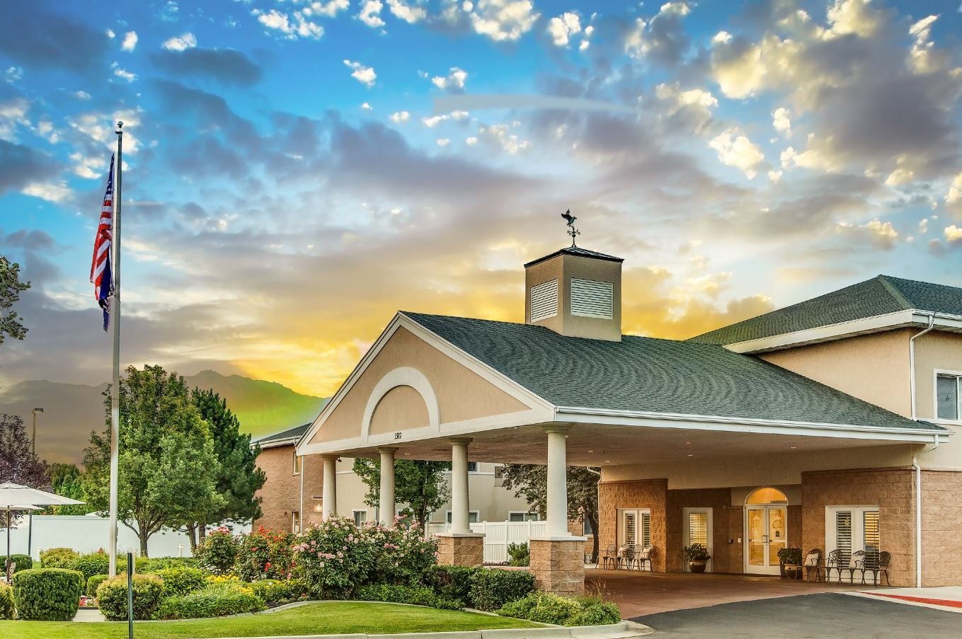 Exterior view of the facility with landscaped garden