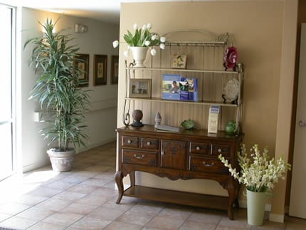 Interior lobby area with decor and plants
