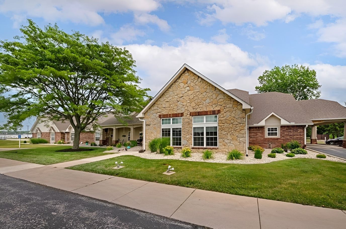 Exterior view of Brookdale Richmond with landscaped garden