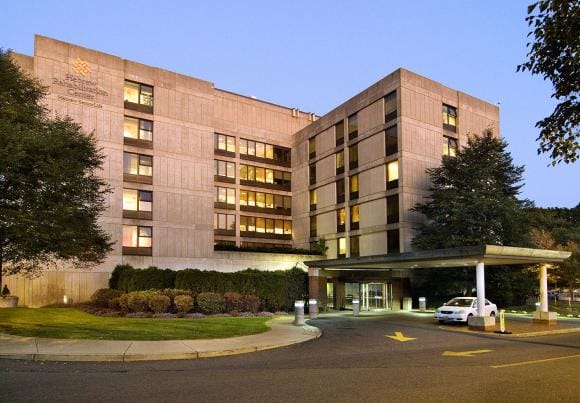 Hebrew SeniorLife, Nursing Home in Boston, MA — Exterior view of the nursing home building at dusk