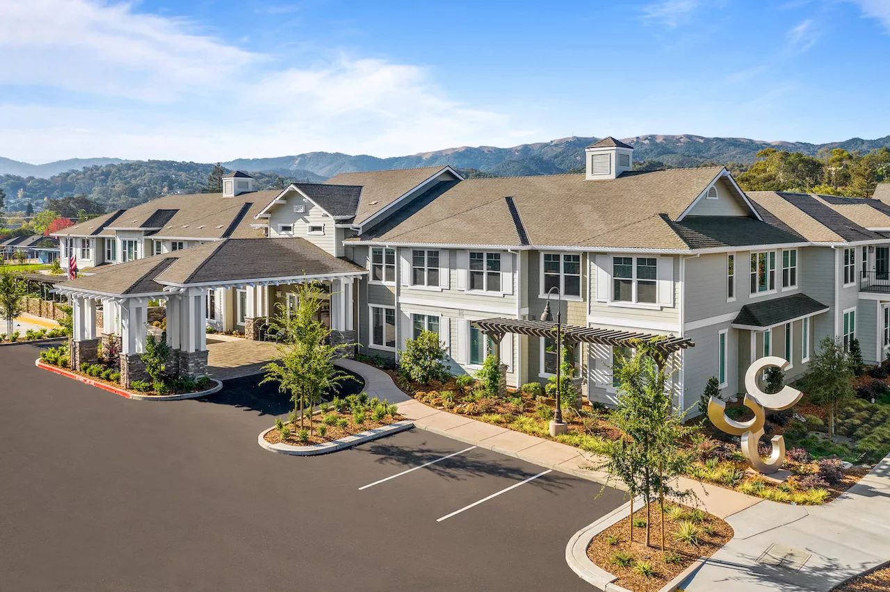 Exterior view of Oakmont of Novato with landscaped entrance