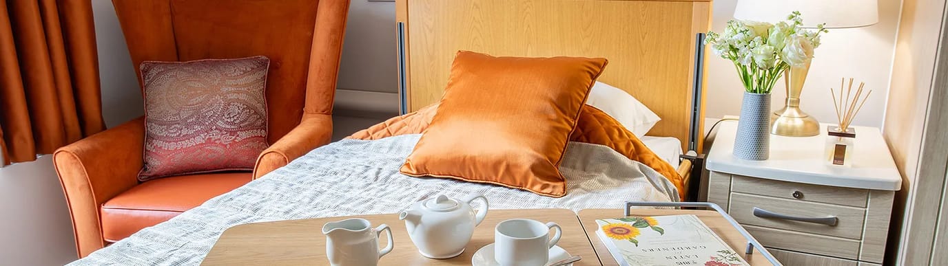Cozy resident room with a comfortable bed and decor