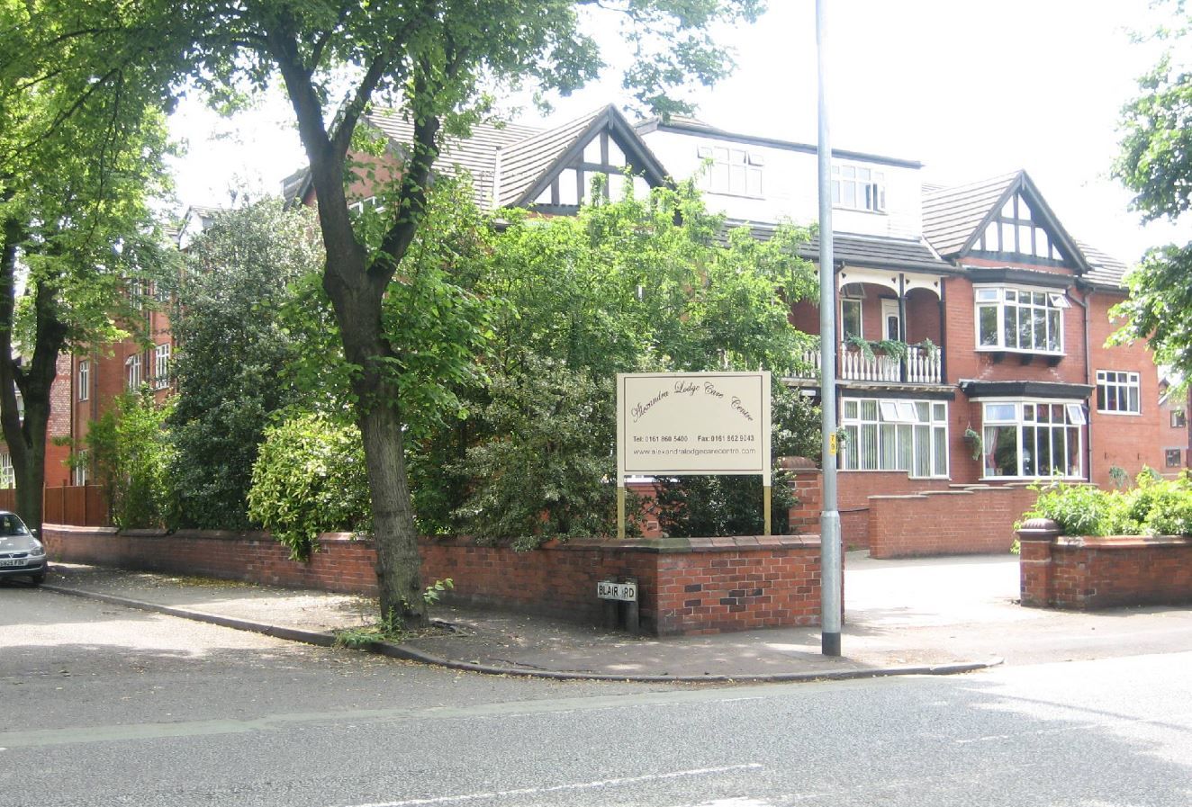 Exterior view of Alexandra Lodge Care Centre with signage.