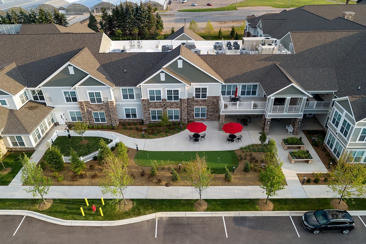 Aerial view of the facility with landscaped grounds