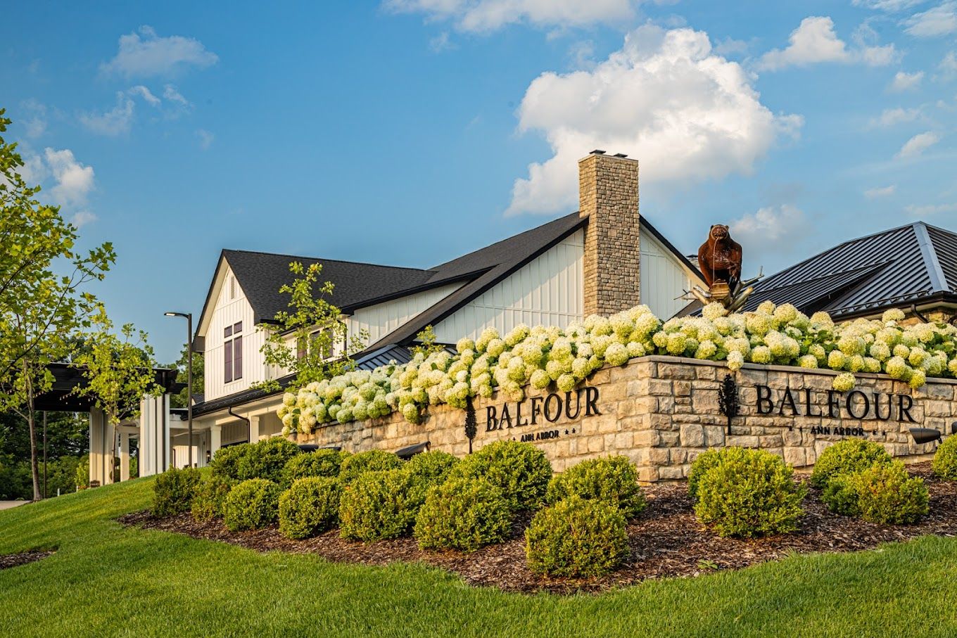 Exterior view of Balfour Senior Living entrance with landscaping