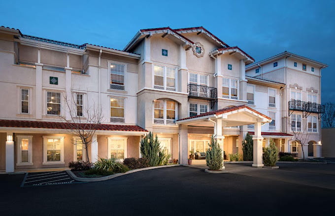 Front exterior of Belmont Village senior living facility.