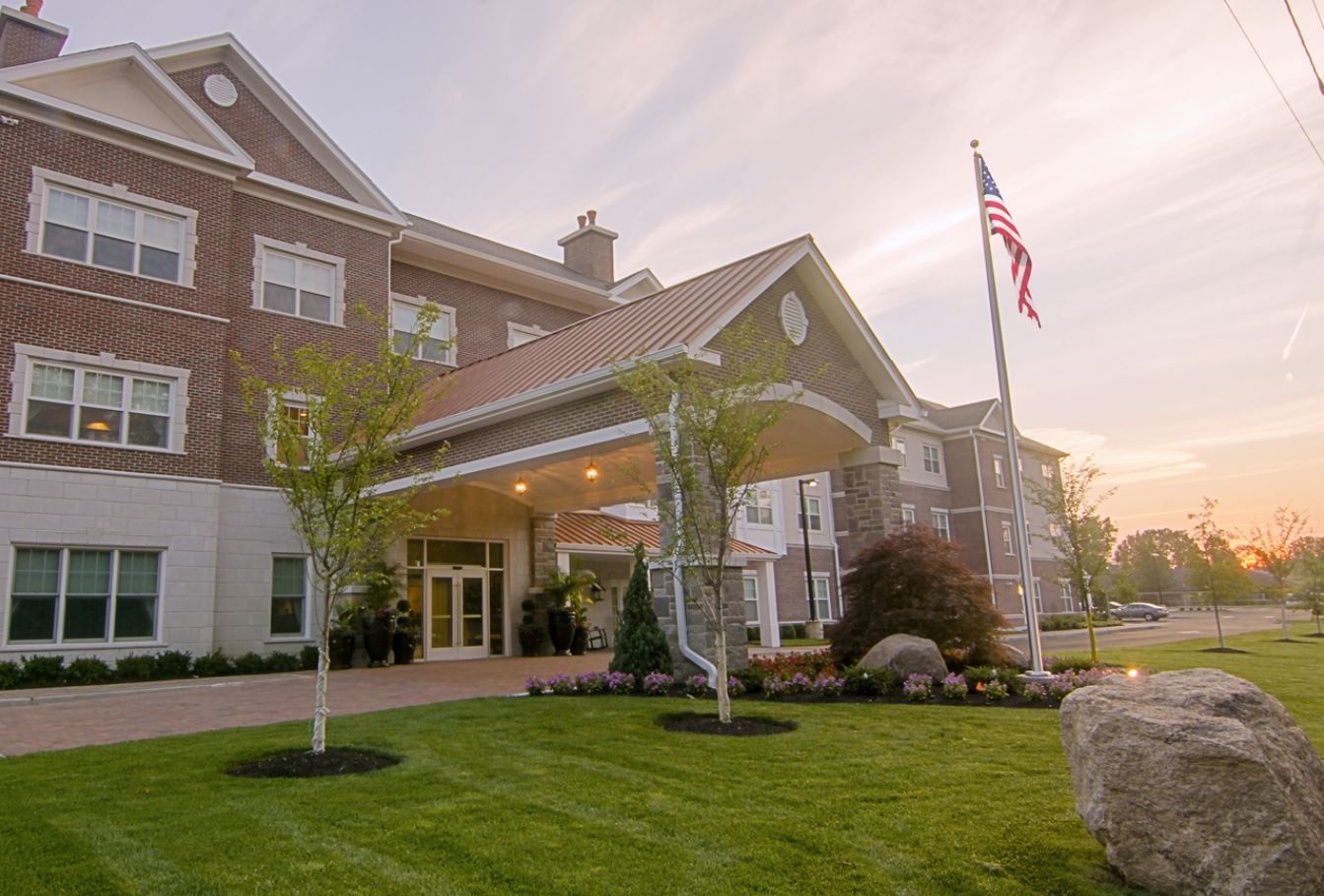 Exterior view of the facility building with landscaping