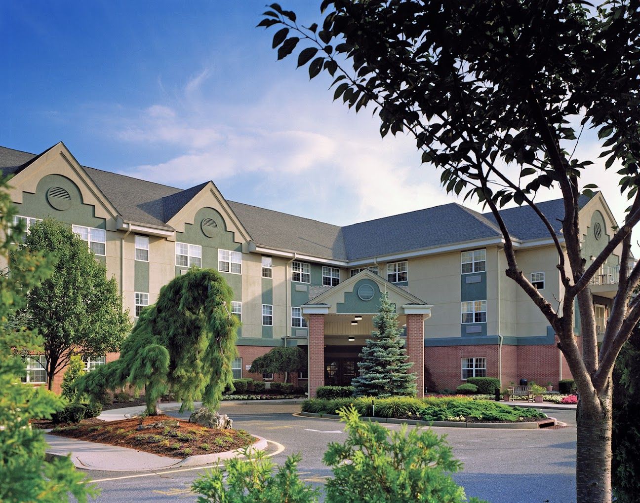 Front exterior of Brandywine The Gables with landscaped entrance