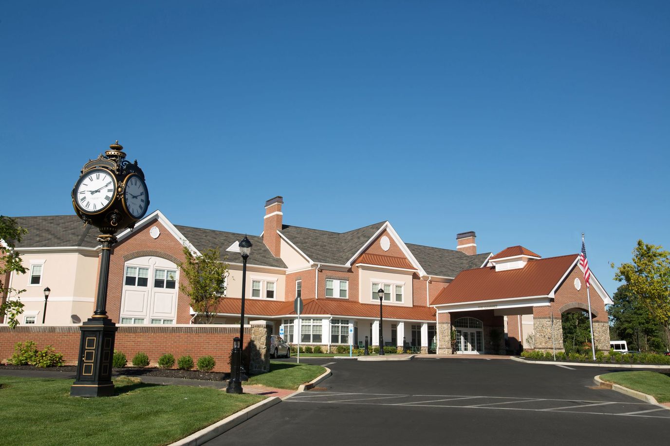 Exterior view of Brandywine Voorhees facility with clock