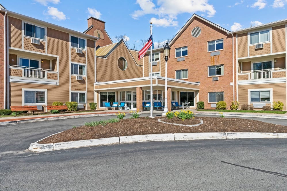 Exterior view of the facility with landscaped area