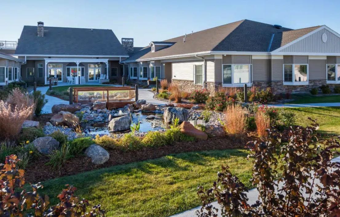 Beautiful outdoor space with water feature and gardens