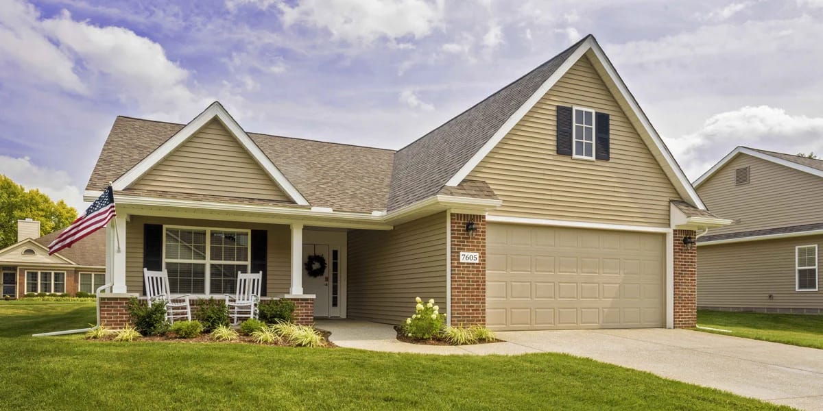 Exterior view of a senior living patio home with porch