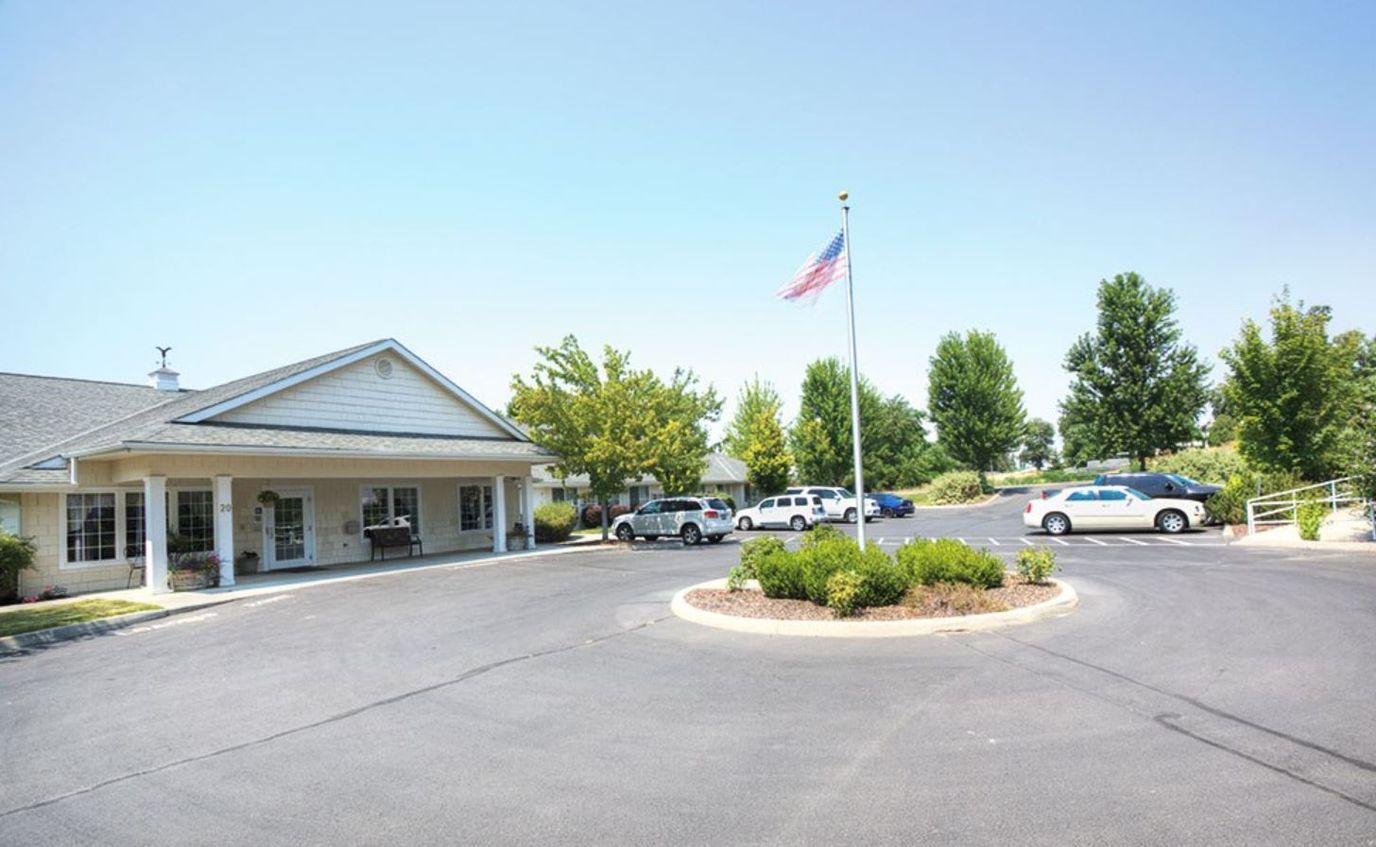 Exterior view of Eagle Springs facility with flag and entrance