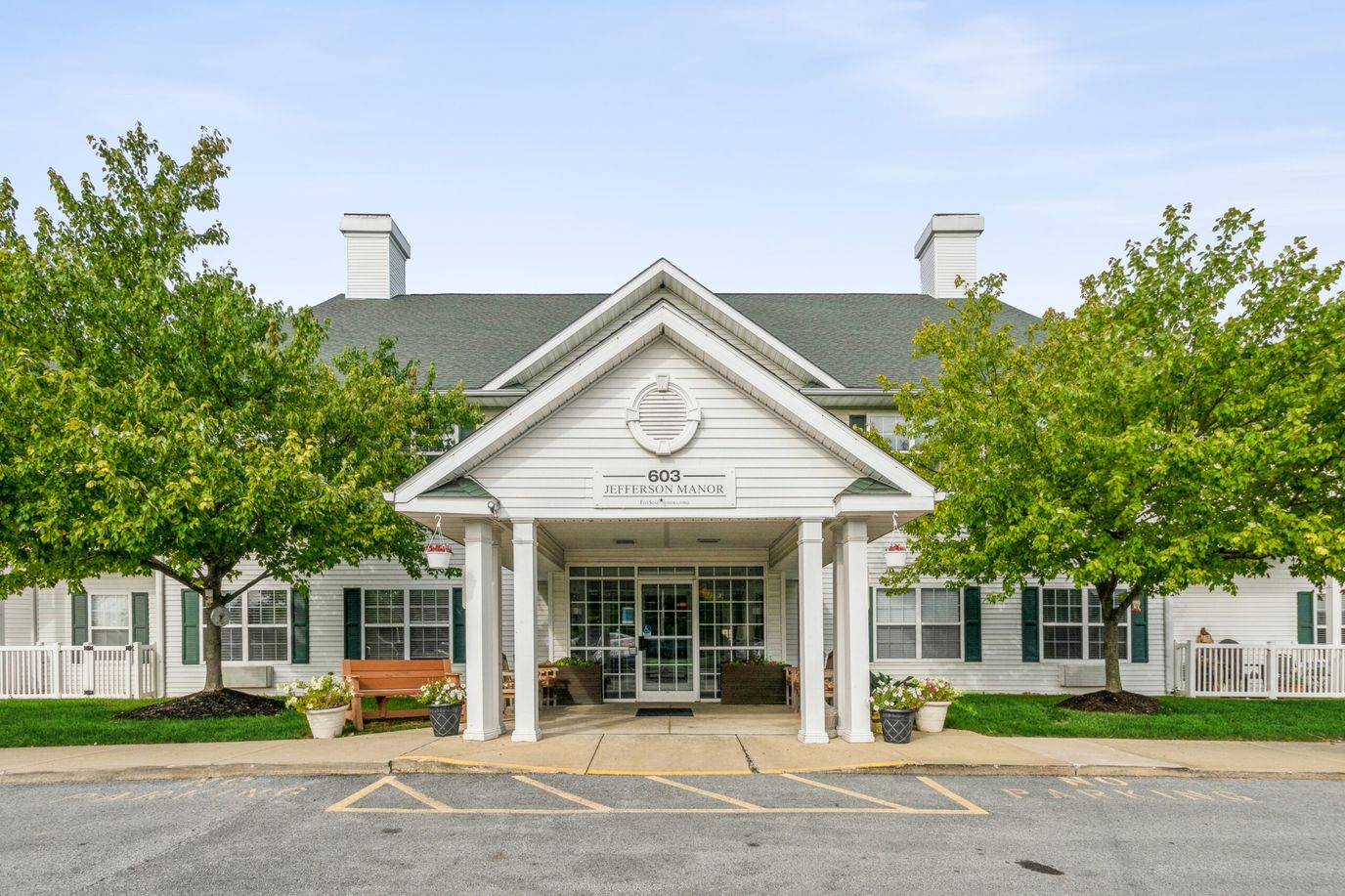 Front entrance of Jefferson Manor with landscaping