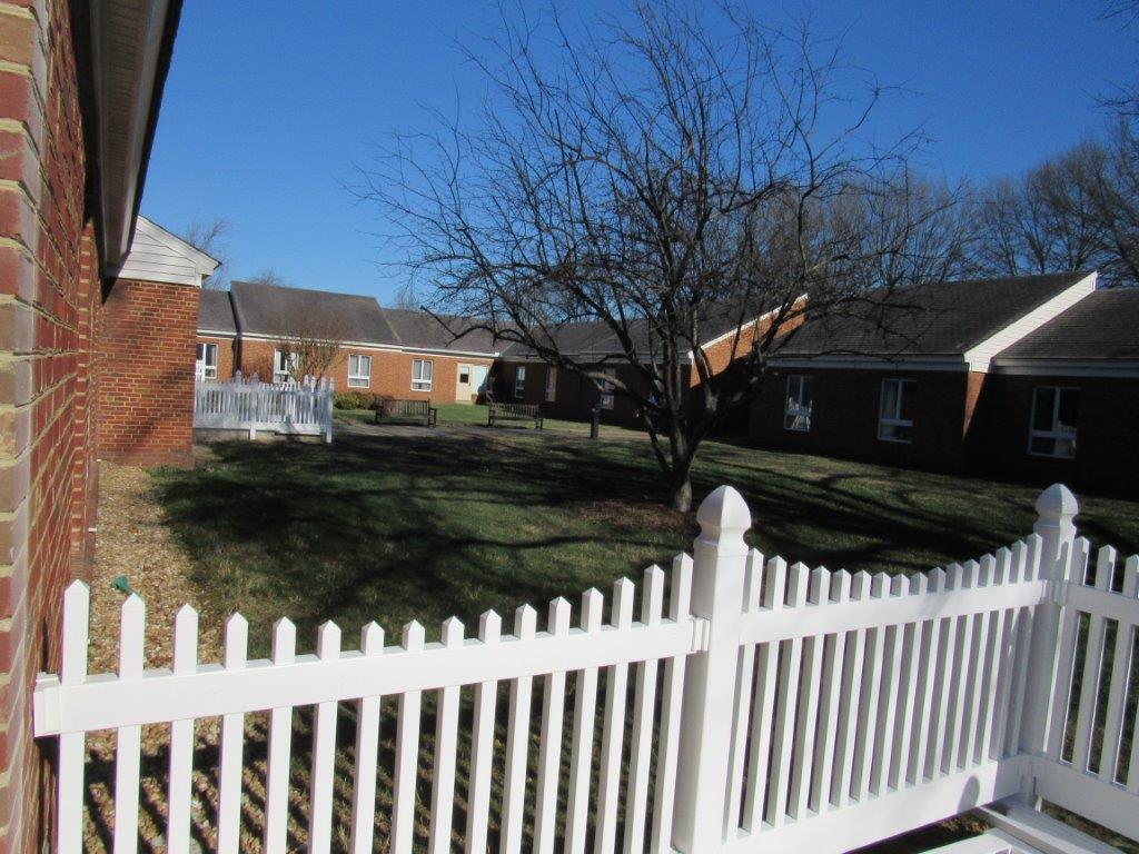 View of the outdoor space with buildings in the background