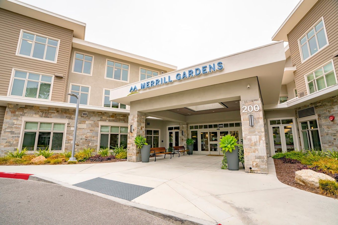 Exterior view of Merrill Gardens at Monterey entrance