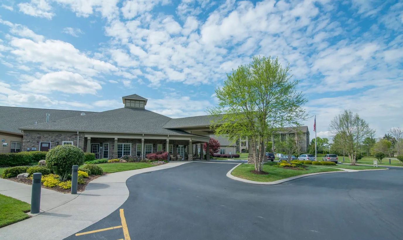 Exterior view of Morning Pointe facility with landscaping