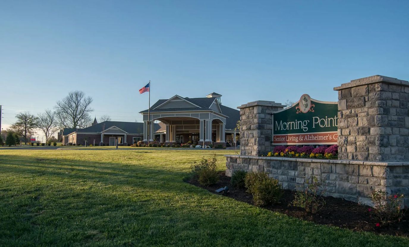 Exterior view of Morning Pointe facility with signage