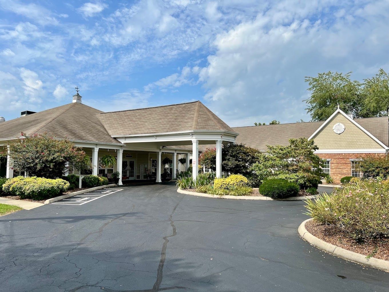 Exterior view of the facility with landscaping and entrance