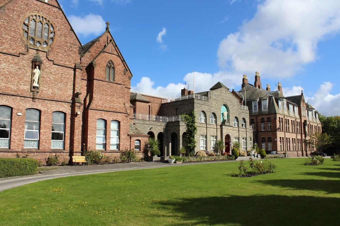 Exterior view of Nazareth House Crosby with landscaped garden