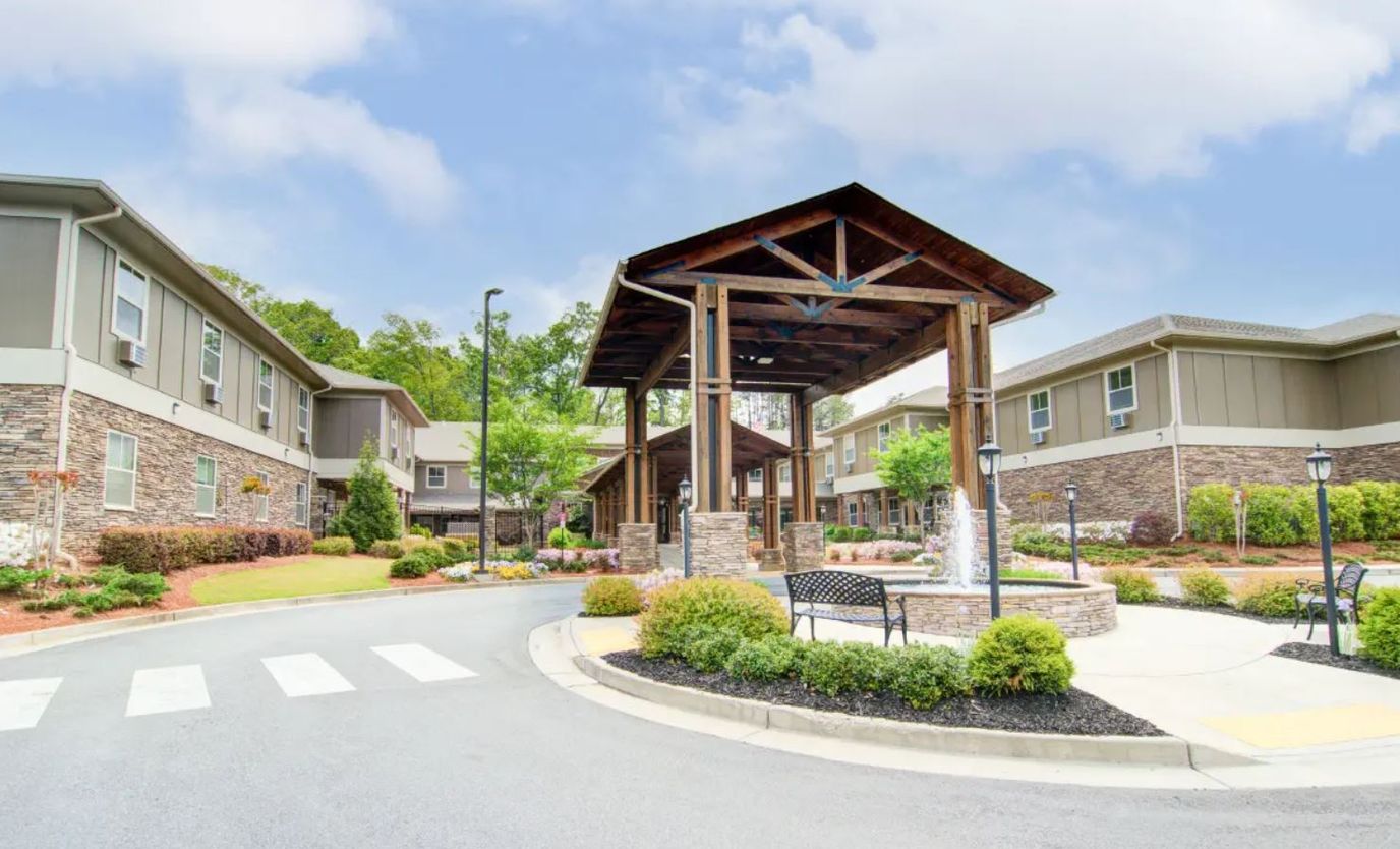 Exterior view of the facility with a wooden entrance