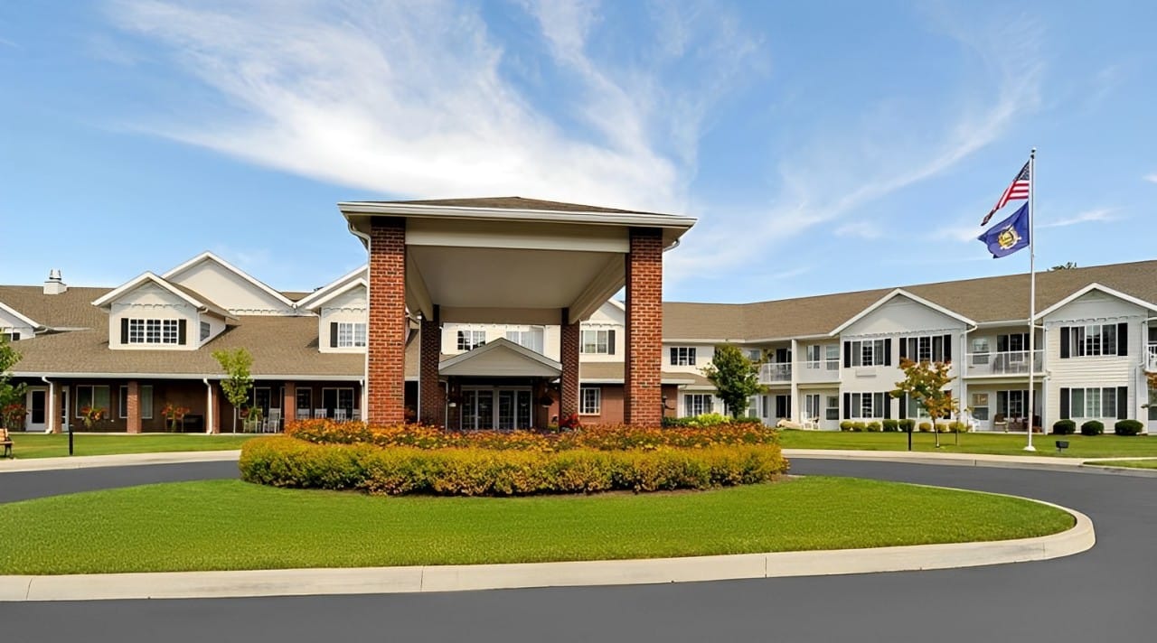 Main entrance of the assisted living facility with landscaping