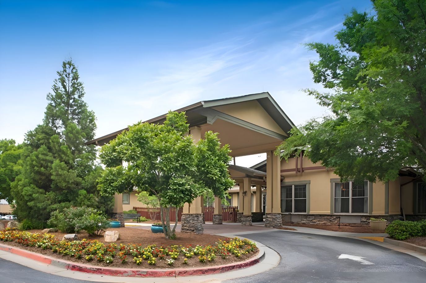 Front entrance of Sunrise at Webb Gin with landscaped garden