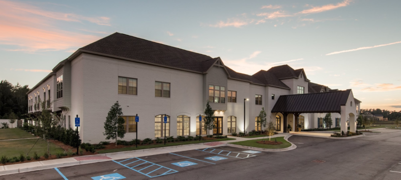 Exterior view of The Blake at Carnes Crossroads at sunset
